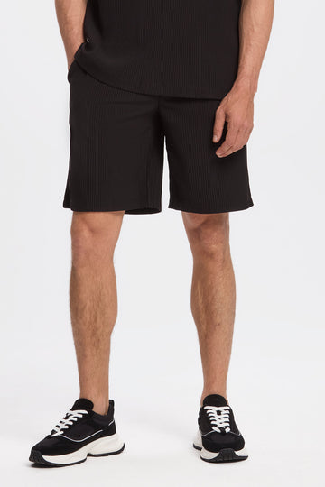 Los pantalones cortos plisados