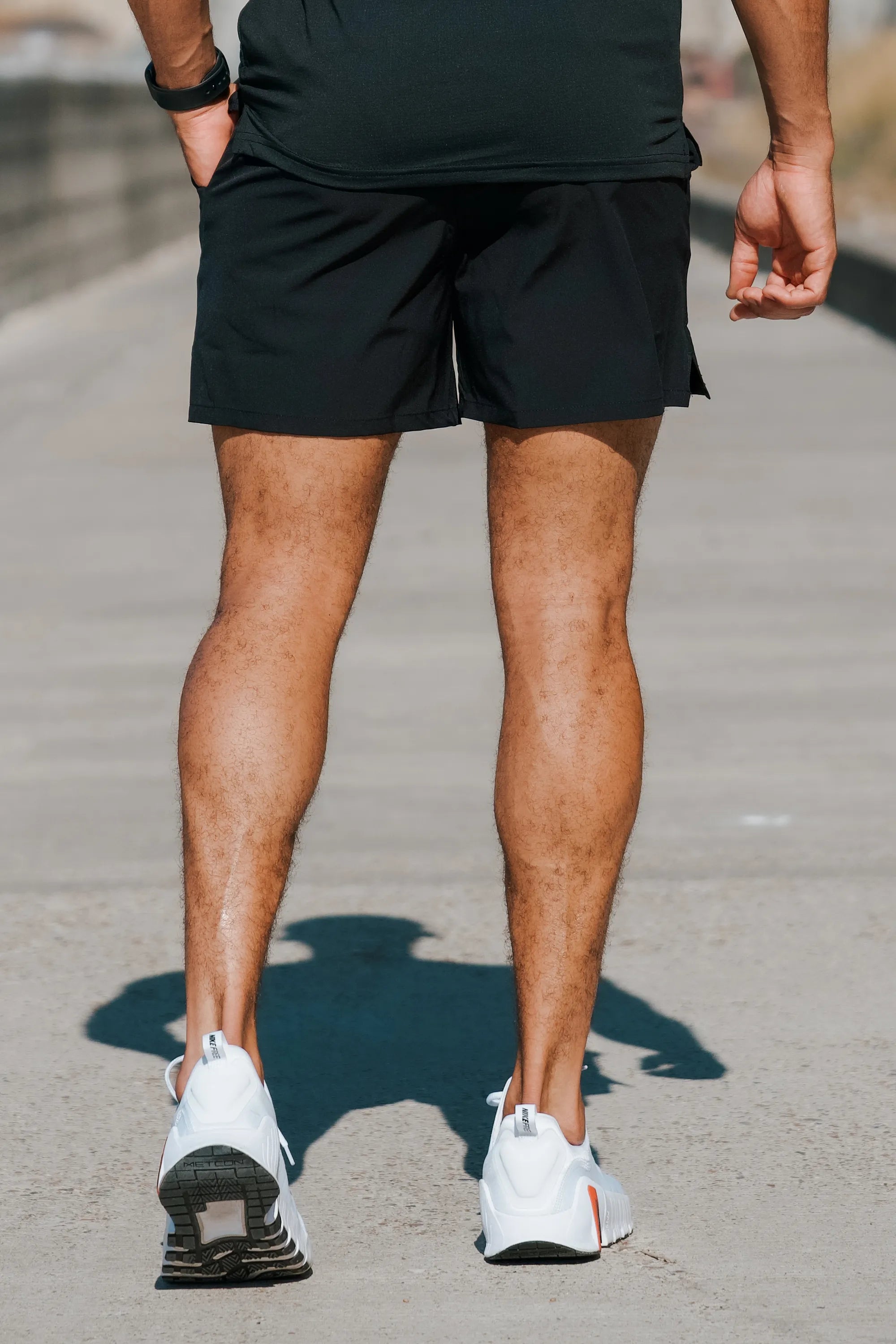 Los pantalones cortos activos del icono