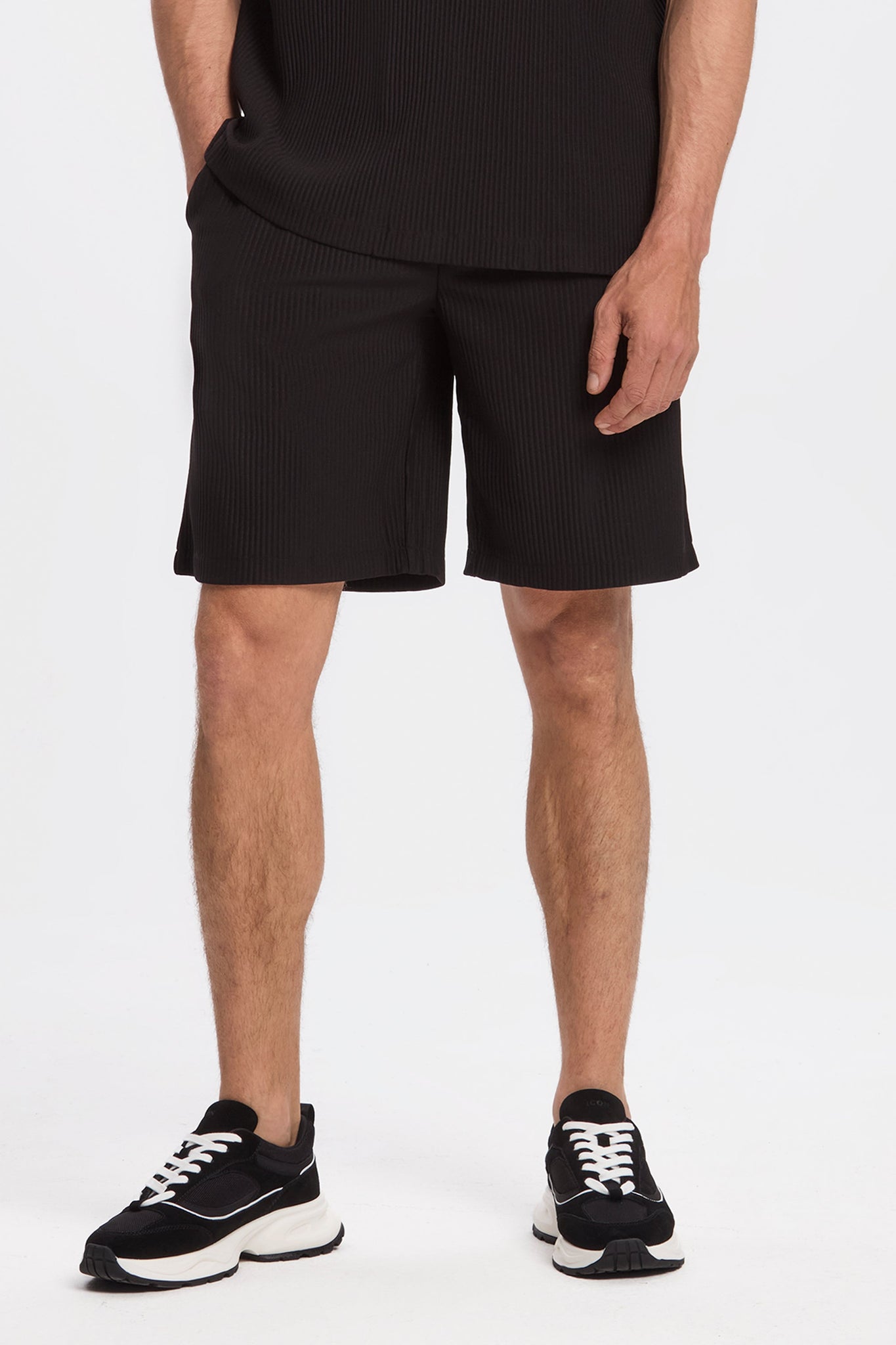Los pantalones cortos plisados