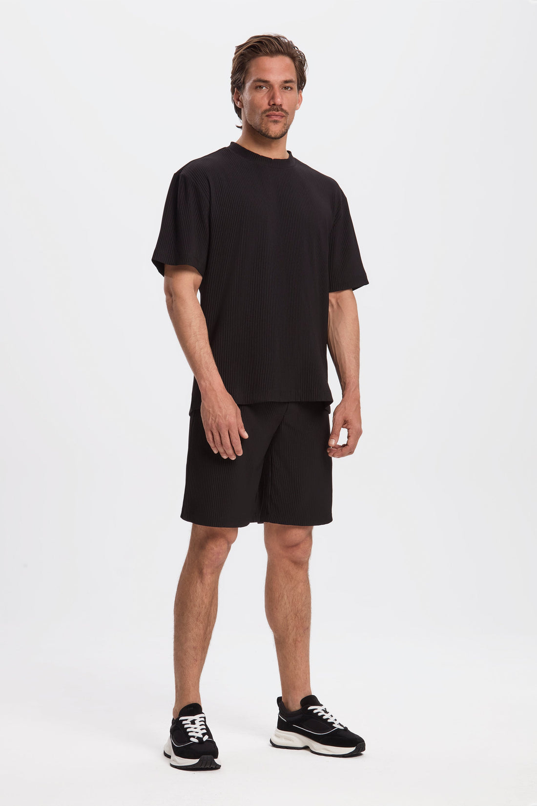 De veckade shortsen
